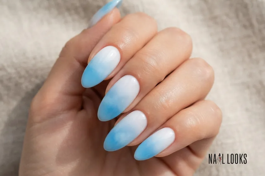 sky blue ombre May nails on long almond nails