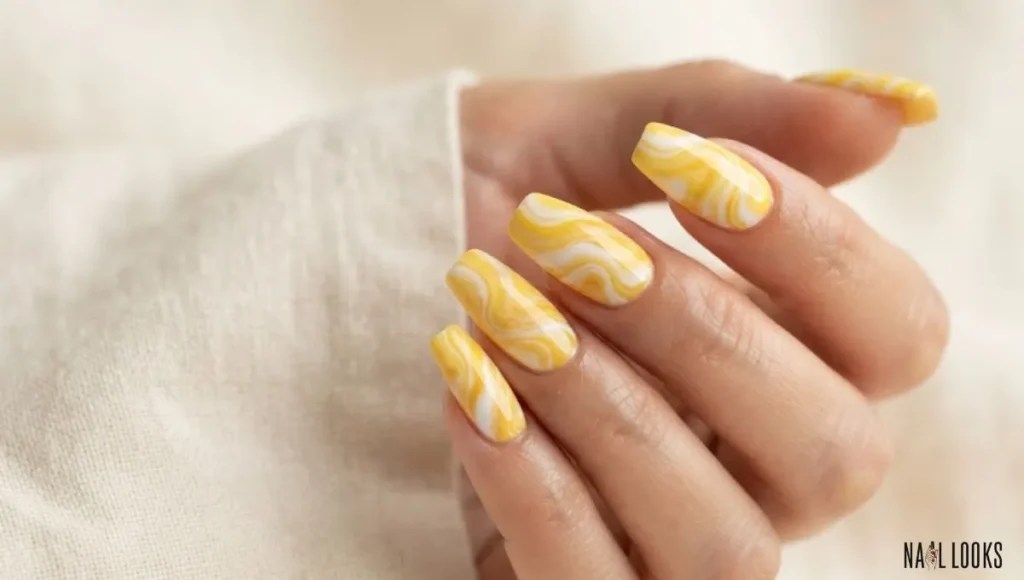 Yellow and White Swirl Nails